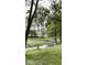 Peaceful landscape with a creek flowing through a grassy meadow at 5465 S State Road 75, Jamestown, IN 46147