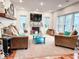 Cozy living room with fireplace and large windows at 5465 S State Road 75, Jamestown, IN 46147