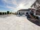 Large patio area with seating and a view of the pool and house at 5465 S State Road 75, Jamestown, IN 46147