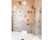 Spa-like shower with multiple shower heads and built-in shelves at 5465 S State Road 75, Jamestown, IN 46147