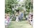 Bride and groom walking down aisle after wedding ceremony at 5465 S State Road 75, Jamestown, IN 46147