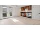 Finished basement with wet bar, wine fridge, and access to backyard at 588 E Vermont St, Indianapolis, IN 46202