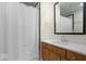 Clean bathroom with shower, vanity, and mirror at 588 E Vermont St, Indianapolis, IN 46202