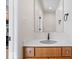 Simple bathroom with wood vanity and gray sink at 588 E Vermont St, Indianapolis, IN 46202