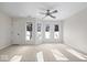 Spacious bedroom with large windows and ceiling fan at 588 E Vermont St, Indianapolis, IN 46202