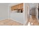 Eat-in kitchen with breakfast bar and hardwood floors at 588 E Vermont St, Indianapolis, IN 46202