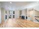 Spacious living room featuring hardwood floors and a fireplace at 588 E Vermont St, Indianapolis, IN 46202