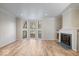 Living room with hardwood floors and fireplace at 588 E Vermont St, Indianapolis, IN 46202