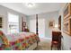 Bedroom with four-poster bed, carpet and window at 7652 Winding Lake N Dr, Noblesville, IN 46062