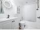 Clean bathroom with white vanity and shower/tub combo at 8043 Garden Ridge Rd, Indianapolis, IN 46237