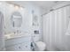 Clean bathroom with white vanity and shower at 8043 Garden Ridge Rd, Indianapolis, IN 46237