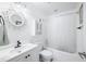 Clean bathroom with white vanity and shower/tub combo at 8043 Garden Ridge Rd, Indianapolis, IN 46237