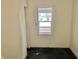 Vacant bedroom with a window, showcasing natural light and potential for customization at 817 N Linwood Ave, Indianapolis, IN 46201
