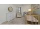 Inviting Bedroom with a crib, dresser, and comfortable chair, creating a cozy and functional space for baby at 8198 Wade Hill Ct, Indianapolis, IN 46256