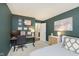 Comfortable bedroom featuring a desk area, modern decor, and an ensuite bathroom at 8198 Wade Hill Ct, Indianapolis, IN 46256