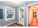 Small bathroom with city-themed shower curtain and hardwood floors at 8365 N Pennsylvania St, Indianapolis, IN 46240