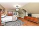 Spacious bedroom with wood floors, large windows, and ample closet space at 8365 N Pennsylvania St, Indianapolis, IN 46240