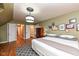 Primary bedroom with hardwood floors, access to hallway and other rooms at 8365 N Pennsylvania St, Indianapolis, IN 46240