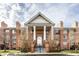 Brick building exterior with grand entrance and landscaping at 8650 Jaffa Ct W Dr # 12, Indianapolis, IN 46260