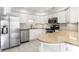 Updated kitchen, featuring stainless steel appliances and granite countertops at 8650 Jaffa Ct W Dr # 12, Indianapolis, IN 46260