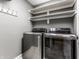 Laundry room with modern washer and dryer at 8650 Jaffa Ct W Dr # 12, Indianapolis, IN 46260