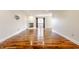 Living room with hardwood floors, fireplace, and patio access at 8650 Jaffa Ct W Dr # 12, Indianapolis, IN 46260