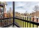 Private patio overlooking a community tennis court at 8650 Jaffa Ct W Dr # 12, Indianapolis, IN 46260