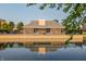 Community pond reflecting building at 8650 Jaffa Ct W Dr # 12, Indianapolis, IN 46260