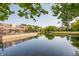 Serene pond with reflection of community building at 8650 Jaffa Ct W Dr # 12, Indianapolis, IN 46260