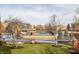 Community pool with surrounding building views at 8650 Jaffa Ct W Dr # 12, Indianapolis, IN 46260