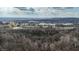 Panoramic aerial view shows community nestled in the trees and by several lakes at 8850 W State Road 46, Columbus, IN 47201