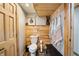 Charming powder room with wood accents and built-in shelving at 8850 W State Road 46, Columbus, IN 47201