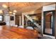 Long dining table in a room with wood accents and natural light at 8850 W State Road 46, Columbus, IN 47201