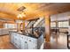 Open kitchen with a large island and views to the dining room at 8850 W State Road 46, Columbus, IN 47201