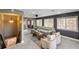 Spacious living area with a comfy sectional sofa and large windows at 8850 W State Road 46, Columbus, IN 47201