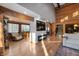 Open living area featuring a modern fireplace and built-in shelving at 8850 W State Road 46, Columbus, IN 47201