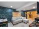 Finished basement playroom with sectional sofa and game area at 8850 W State Road 46, Columbus, IN 47201