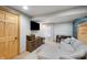 Finished basement playroom with sectional sofa and game table at 8850 W State Road 46, Columbus, IN 47201