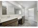 Double vanity bathroom with a view of a bedroom at 1011 Grassy Branch Dr, Indianapolis, IN 46239