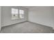 Bedroom with carpet and two windows at 1011 Grassy Branch Dr, Indianapolis, IN 46239