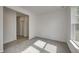Spacious bedroom with carpet flooring and large window at 1011 Grassy Branch Dr, Indianapolis, IN 46239