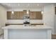 Modern kitchen with stainless steel appliances and marble countertops at 1011 Grassy Branch Dr, Indianapolis, IN 46239