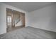 Bright living room with carpet flooring and views to entryway at 1011 Grassy Branch Dr, Indianapolis, IN 46239
