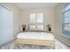 Serene bedroom featuring a cozy bed, light walls, and a bright window for ample natural light at 10229 Canal Way, Noblesville, IN 46060