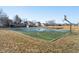 Playground area with basketball court and swing sets for Gathering enjoyment at 10229 Canal Way, Noblesville, IN 46060
