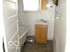 Bathroom with clawfoot tub and pedestal sink at 1053 W 35Th St, Indianapolis, IN 46208