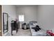 Cozy bedroom with a full-size bed and vinyl flooring at 117 N Sheffield Ave, Indianapolis, IN 46222
