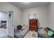 Bedroom with two beds and a dresser, offering ample space at 117 N Sheffield Ave, Indianapolis, IN 46222