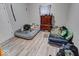 Bedroom with two beds and a dresser, offering ample space at 117 N Sheffield Ave, Indianapolis, IN 46222