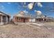 Quaint bungalow home with a landscaped yard at 117 N Sheffield Ave, Indianapolis, IN 46222